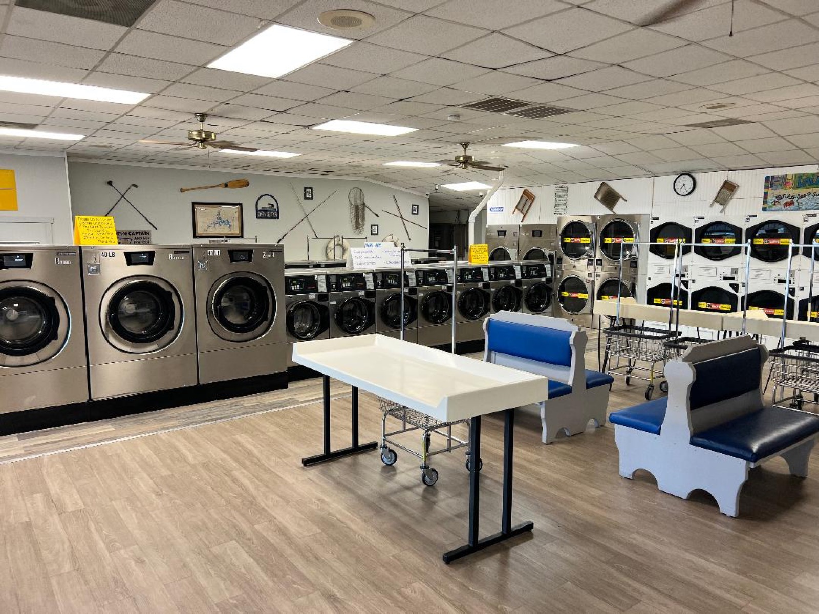 Front-loading washer rows at Clean Jeans Laundry